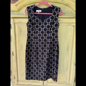 Sleeveless black and gold dress